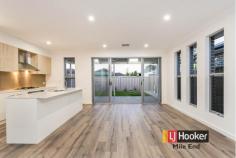 51a Minns St Seaton SA 5023 Brand New Large Living Quality Features Why build and wait when you can buy one of these magnificent family size homes sitting on approx 352sqm Torrens Titled allotments. Brand new and ready to move in, you will love these homes as much as we do. Featuring: - 3 bedrooms, master with walk-in-robe and ensuite - Bedrooms 2 & 3 with built-in-robes - Multiple living areas; including separate lounge plus open plan dining and living rooms - Quality fittings throughout - Spacious kitchen with stone bench tops, quality cabinetry, glass splashback, stainless steel appliances and a dishwasher - Ducted reverse cycle air-conditioning - LED down lights - 2.7m ceilings - 2.4m doors and windows - Intercom and alarm system - Alfresco entertaining area - New fencing, aggregate concrete driveway and yard landscaping Seaton is a booming suburb located perfectly between the City and the Sea and becoming the suburb of choice for families and working professionals. Contact Justin Peters of LJ Hooker on image: chrome-extension://lifbcibllhkdhoafpjfnlhfpfgnpldfl/call_skype_logo.png0423 341 797 for more information and inspection times. Note: Images and floorplan are of 51a Minns St Seaton. RLA: 242 629 Property Snapshot Property Type: House