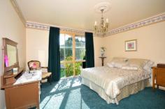 5 Dovette Ct Wheelers Hill VIC 3150 Well Loved Family Home Wonderful opportunity to secure this spacious family home with huge potential, on 689m2 in a quiet court location, in this highly sought after pocket of Wheelers Hill. Comprising 4 robed bedrooms plus study, three separate living areas including spacious lounge/dining room, galley style kitchen opening out to meals/family area leading outside to paved entertaining area and lovely garden surrounds. Massive upstairs rumpus room with the possibility of converting into a self-contained apartment with its own bedroom, bathroom and kitchenette. Extras include ducted heating, three air conditioners, kitchen bay garden window with stain glass feature, carport and garage with workshop area. Bring this home back to full life or fantastic development potential (STCA). Easy stroll to schools, shops, public transport & reserves. Features Ducted Heating Built-In Robes Rumpus Room Price Guide: Contact Agent | Land: 689 sqm approx | Type: House | ID #533877