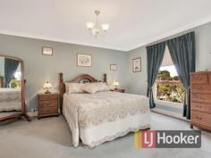 4 Bayview Parade Gulfview Heights SA 5096 "PRICE REVIEW" No.4 Bayview Parade is for sale and presents itself as an outstanding opportunity for you to secure a big and beautiful residence that creates a wonderful sense of country charm and oozes style and prestige. The property spans a generous 1,203 m² elevated corner allotment with spectacular views plus a huge detached double garage accessible via a side gate. The home features four spacious bedrooms, main with walk-in-robe plus ensuite and built-in's to bed 4. There are multiple living areas with a spacious lounge/dine area as well as a formal lounge plus parents retreat upstairs. The carefully designed floor plan works well with integrating a busy family life and windows all-round allow an abundance of natural sunlight to enter into the home making it feel spacious and airy. The neat and functional kitchen is fitted with quality appliances including dishwasher and there is ample cupboard storage space as well as a step-in pantry and handy breakfast bar. Step outside and entertain all-year round with family and friends under the paved alfresco area surrounded by the manicured and low maintenance garden setting with a sizable yard area for kids and pets to enjoy. Comforts include log-look gas heater, rev-cycle split a/c plus a ducted evap a/c upstairs, security alarm system, double auto roll-a-door lockup garage with safe internal entry and fully reticulated watering system... just to name a few... Located close to schools, parks and bus routes and only a short 5 minute drive to the Village Shopping Precinct full of specialty shops. Arrange to take a closer look now at this fantastic opportunity Property Snapshot Property Type: House House Size: 265.00 m2 Land Area: 1,203 m2 Features: Alarm Balcony Built-In-Robes Close to schools Dishwasher Ducted Cooling Ensuite Established Gardens Walk-In-Robes