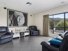 39 Snug Tiers Rd Snug TAS 7054 $599,000 If its space you're after, this property has it! This impressive double storey home has plenty of room for the entire family. Situated on a flat block (approx. 2378m2) where children and pets can safely play all day long. Park the caravan, boat, trailer and anything else… there is loads of room for everyone. Upon entering the home, the quality of the home is evident. All of the spacious bedrooms have built-in-robes and the master has walk-in-robes and an ensuite. The top level of the home has two great entertaining areas. One being the tasteful kitchen/dining/lounge area and adjacent is the family/theatre room that has its own projector screen and speaker system. There is even a great built-in bar. Also off the top level is an enormous suspended concrete deck with full length cover making it the ideal alfresco dining or party area. The house has nice views of the D'entrecasteaux Channel to Bruny Island also lovely views of Mount Wellington. The entire home has ducted air conditioning, regulating the temperature throughout the year. Ground level has a remote controlled double garage, big laundry and 2 multi-purpose utility rooms. A short stroll down the road has Snug Primary school, shops and services all well within your sights. So if it is space you're after, this modern, spacious home is well worth a look. Property Snapshot Property Type: House House Size: 306.58 m2 Land Area: 2,378 m2 Features: Airconditioning Built-In-Robes Dishwasher Ensuite Verandah Walk-In-Robes