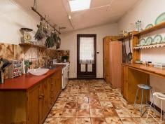 8 High St Strathalbyn SA 5255 $319,950 OPEN SATURDAY 23/4/2016 - 11AM - 11:30AM Property ID: 8668062 “Stone Gate Cottage c1860 Standing the test of time and proudly sited on historic High Street is this charming bluestone return verandah villa. The character home is positioned on a manageable 468m2 allotment within a stone’s throw to township facilities. The traditional floor plan features a spacious family lounge, formal lounge, kitchen with dishwasher, dining room, 3 bedrooms, renovated bathroom, laundry and a delightful cellar. The villa has many quality features including polished timber floor boards, operational open fireplaces with appealing surrounds, glass panelled interior doors, combustion heating and reverse cycle split system air conditioning. Attached to the rear of the home is a quaint paved outdoor living area with caf blinds ideal for year round entertaining. Further external improvements include a double carport, 6.2 × 6.3m colorbond lock up garage complete with cement floor and power and rainwater storage plumbed to the home. The location of this property, being adjacent to the northern end of the popular antique centre is well placed for many uses including Bed & Breakfast and professional services, notwithstanding the fact that the property is located within the township zone code of Residential (Strathalbyn) Precinct 23 Strathalbyn Historic Central, and any change would necessitate Council approval. Property History- John Stephens, a butcher acquired an L shaped part of Lot 38 in 1860. In 1861 it passed to William Stephens, a blacksmith. From 1866 Stephens leased the property to other blacksmiths. The section behind William Read’s allotment was sold off to Colin Thomas in 1884. The remaining part of the property was transferred to Isaac Wheadon, a blacksmith, a few weeks later. Wheadon has leased this property and part of Lot 39 from William Stephens before purchasing it. Wheadon mortgaged the property to William Stephens and Stephens gained possession later in 1884. Robert Thomas acquired the property in 1908 and it was subdivided in 1920. Henry Marshall Hall Robinson bought this part of the land in 1921. He sold it in 1923 to George Thredgold, a mason, who owned until his death in 1938. Land Area 468.0 sqm