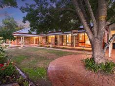 83 Turners Gully Rd Clarendon SA 5157 $750,000-$790,000 This amazing “Australian Colonial” executive home is a class above the rest. Nestled amongst the trees in a most sought after location, very close to the quaint township of Clarendon with room to move on just approximately 1 acre. The gully views will thrill. A most desirable small holding with attention to detail, miles from anywhere and minutes to everywhere. Features include; • 268sqm of quality living with emphasis on entertaining • Extensive timber flooring • 4/5 bedrooms, master offering sparkling ensuite (features claw foot bath & bay window) and WIR • Deluxe French provincial kitchen featuring Smeg & Miele stainless steel appliances, granite bench tops, Jarrah topped island, abundance of storage and more • Superb Home theatre featuring dynamic Bose system • Olde world formal dining with ornate ceiling rose and cornice plus mantle • Quality fittings to main bathroom with underfloor heating • Surround verandahs offering year round protection from the elements • 7m x 5m pitch roof paved pergola/entertaining area to while away these lazy summer days. • Ducted Reverse cycle air conditioning, ducted Gas heating and classic slow combustion heater. • Terrific colorbond shedding includes; • 4 bays, all with auto roller doors • Detached Office/Retreat which incorporates • reception area • Separate boardroom’, workroom/office, sep WC, kitchenette, ducted air conditioning. • Ideal work from home option or ideal as teenage retreat/guest wing • Adjacent 7m x 7m high clearance carport, great for the caravan/boat/work vehicles. Fully sealed asphalt driveway. 3 phase power connected plus bonus 3.2kw solar system. Mains water and rainwater connected to the home, and to your veggie patch. Superb quiet location yet handy to the amenities of suburbia, the hub shopping, Westfield Marion, cafes and restaurants of Glenelg, wineries of McLaren Vale and southern beaches Building / Floor Area 268 sqm Land Area 3,880.0 sqm