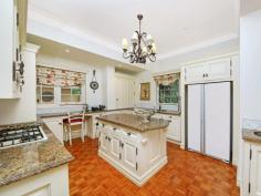 19 Warwick St Killara NSW 2071 Magnificent Family Living in Size, Quality and Beauty Find yourself immersed in the comforts of this stately Mediterranean style home on approximately 6,007sqm of sprawling lush gardens and level lawns. Private driveway to it's elevated position enhances glorious outlook of picturesque park like grounds for friends and family entertaining on mass. Circa 1938 designed by F. Glynn Gilling showcases splendour and quality craftsmanship over two palatial levels, the "WOW" factor from foyer leading to the formal lounge with moire silk adorned walls, gas fireplace and bay windows with French doors to enjoy the view off an alfresco north facing terrace is priceless. Adjoining this covered terrace a sitting/piano room. Recreation plus is the north-south championship size tennis court. Double brick built with finesse & quality in mind. Romanticism in the air, the home offers an exquisite staircase, soaring ceilings with decorative cornices, period lighting, window drapes and shellac textured walls. Delightful conservatory, 2 powder rooms and superbly appointed kitchen with granite bench tops and parquetry flooring add a touch of class. Main bedroom boasts a spa ensuite, walk-in robe and sun-drenched balcony whilst on the same level other bedrooms ideal for growing family, au pair living are spacious in size include wardrobes, large framed colonial windows capturing the wonderland outside. Uniquely occupying 3 titles with rear gate pedestrian access in one of the more quiet and private pockets of Killara, ample off street & garage parking and double carport. This property is a must see! Close vicinity to Chatswood, Sydney CBD, convenient short 5 mins walk to Killara Primary School, Killara Station and 10 mins to Ravenswood Girls, nearby select schools, golf courses, restaurant establishments and major shopping centres. To view contact Lavenia Liu 0413 555 017 DISCLAIMER: All information contained herein is gathered from sources that we believe reliable. We have no reason to doubt its accuracy, however we cannot guarantee it. This information is not to be used in formalising any decision nor used by nor used by a third party without the expressed written permission of LJ Hooker Gordon. Property Snapshot Property Type: House Construction: Double Brick Features: Alarm Built-In-Robes Ensuite Established Gardens Fenced Back Yard Granite Benches Parquetry Floors Storage