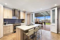 204 Parer Rd Airport West VIC 3042 $580,000 - $640,000 Move In And Enjoy A Quality Renovation! Moments from Westfield Shopping Centre, Hansen Reserve, St Christopher's Primary School and public transport, this recently renovated three bedroom home exudes warmth, space and modern comfort. Two living zones intertwine presenting abundant space for all the family. Furthermore, any occasion is enhanced with an expansive entertaining deck, drenched in northerly sunshine with a neat sweep of lawn beyond for relaxation and children's play. The kitchen presents 900mm cooking appliances and dishwasher, all finished in stainless steel along with breakfast bar and glass splashbacks whilst the central and ensuite bathrooms are contemporary in style and faultless in function. The bedrooms are generous, each with BIRs and there's also a European laundry, ducted heating, evaporative cooling and full side driveway to garage. On approximately 601m2, options are open (subject to all relevant approvals), and satisfaction assured! Features Ducted Heating Built-In Robes Evaporative Cooling Dishwasher Deck Floorboards