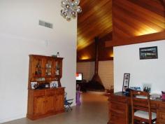 29 Crane St Longreach QLD 4730 $475,000 An Architectual Masterpiece Looking for a home with a point of difference? Situated on a fantastic 2924m2 block is this large homestead which will impress! Inside, the large living room is complete with fireplace, tiled flooring and large blinds which can be opened to enjoy the scenery to the front of the home. A formal dining room adjoins this however is separate. The kitchen is brand new with the vendor selecting attractive neutral tonings. An informal dining area also adjoins this. In the centre of the home is a large tiled room with glass windows and doors and is visable from two sides of the home. Originally for an internal greenhouse, this is the perfect place for the kids toy and play room or could easily be turned into further living space or returned to it's former glory! The master bedrooms features a walk through robe which leads to the ensuite bathroom. Three of the other bedrooms include built in robes and carpeted flooring. The fifth bedroom is perfect for guests with tiled flooring and away from all other bedrooms. The main bathroom includes a large spa bath and separate shower.