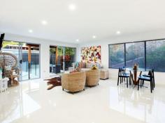 39 Mingaletta Dr Ashmore QLD 4214 $675,000 - $725,000 Seeking a Home with the Wow Factor? Look No Further! No expense has been spared in this amazing renovation, its the little extras that make the extraordinary difference in this gorgeous contemporary residence. Featuring an oversized grand timber door entrance flowing onto a custom built solid timber staircase that leads you into the large air conditioned open plan living area which incorporates indoor/outdoor living effortlessly. Houses of this calibre in this price range have been flying out the door so please don't delay as this beautiful abode will be no different! * Huge mastersuite with full length walk in robe and fully renovated ensuite * Oversized 4th bedroom with high raked ceilings (could be used as a second living area, children's retreat or home office) * Enormous chefs kitchen with stone benchtops, 2pac cupboards, gas cooktop and large breakfast bar * Beautiful second bathroom with freestanding bath, large shower. * Powder room with direct access from outside to avoid water from the pool being walked through the house * Large undercover outdoor area with bar/servery overlooking the in-ground swimming pool * Lots of grassed areas for the children or pets throughout the large 790m2 allotment * Brand new colorbond roof with new insulation and warranty * Double lock up garage with new Pirie electric double door * New LED lighting and ceiling fans throughout