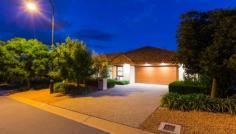 18 Evadell St Gungahlin ACT 2912 Location, luxury & livability Auction to be held on Saturday 30th April 2016 at 10:00am onsite Have you been thinking about building because you just can’t find the quality that you’ve been looking for? You must do yourself a favor and visit this outstanding family home that not only ticks all the boxes for ultimate easy family living but is in better than new condition. With loads of livability features (listed below) along with design features such as 9 ft ceilings, stunning kitchen, segregated living spaces, stunning alfresco and outdoor living spaces you can really call this property Home. The current owners have put a great amount of thought into the lighting throughout the home, the soft furnishings, flooring choices and lots of little touches that really give the home a gorgeous character. Once you’ve settled in and are ready to leave home you find Yerrabi Pond just a stroll away, have coffee or a meal at the local cafes and restaurants. The Gungahlin region is spoilt for great schools, shopping and lifestyle facilities. The owners have made the difficult decision to down size, so please do not delay your inspection or please call Kaylene or Andrew to discuss this absolute gem. Livability Features; - North facing living areas - In slab zoned Hydronic heating - LED lighting throughout - Ceiling fans in bedrooms and main living areas - Solar panels; 3.1 KW - Solar hot water - Underground rain water tank, pumped to toilets - Low water gardens Other Property Features; - From the covered portico step into a wide entry hall with high ceilings - The home has 2.7meter ceilings throughout - The formal living & dining show off the Red Gum floors plus floor to ceiling windows, gas fireplace and access to the outdoor tiled terrace - The kitchen features 40cm stone bench tops, ILVE 120cm gas cook top & a 120lt oven. - You will love the walk-in pantry, the soft close feature on all the cabinetry & the integrated dishwasher - By the way… the pantry is insulated, just in case you’d like to store some wine - The casual dining & family area is incredibly generous, open plan & very inviting adjacent to the kitchen - Both the formal & informal spaces flow out to large covered Alfresco, great for the largest of family gatherings - Ducted reverse cycle air conditioning throughout - Four channel stereo system to the formal lounge/dining, living, library and alfresco areas, with individual controls for each area - ‘Crimsafe’ screens to the majority of the homes doors & windows - All of the bedrooms are oversized & whilst bedroom 5 is currently fitted out & serves beautifully as a library it is easily restored to a full bedroom - The parent retreat is very special with a custom fitted dressing room, large ensuite with double vanity & the room opens on to the back terrace to soak up some morning sun - Both bathrooms are finished beautifully with floor to ceiling tiles & quality fixtures & the main bathroom features a freestanding bathtub - There is ample storage throughout the home: bedrooms, laundry, hall linen press and garage - Ducted vacuum - Custom joinery to the family room - The professionally landscaped, easy care gardens have been well thought out, are now very well established & give privacy both front & back. - The oversized double garage gives internal access - Automatic, dripper irrigation to the gardens - 287sqm of living - Rates; $2,142.00 per annum - Land Tax; $$3,281.00 per annum if rented Property Snapshot Property Type: House House Size: 287.00 m2 Features: Liveability EER: 5.0