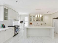 20 Bannockburn Rd Pymble NSW 2073 $3,945,000 SUPERB NEW HOME, DOUBLE BRICK, PERFECT LOCATION! Optimally positioned east side of Pymble this instantly attractive residence in an aesthetically beautiful tree lined street is approximately 800 meters to railway station with convenient access to shopping, private schools, parks, universities and main arterial roads. Quality construction with modern family living in mind, the current owners have emanated a home of timeless Classic appeal through their love of architecture style, beauty and care for the area. Imposing facade boasting a welcoming tiled foyer infusing luxury, with generously proportioned living spaces both formal and casual, bespoke bathrooms, well-appointed kitchen plus more on offer in desirable location close to all you need to enjoy for many years to come. Highlights: * Fully secure and private on near level 930sqm land in family-friendly neighbourhood * 2.7m high ceilings, refined foyer, visually appealing staircase, European signature finishes * Seamless flow throughout light-filled interiors, almost floor to ceiling windows in living rooms * Open plan dining family/dining area with gas fireplace leading to level backyard * Sumptuous French inspired CaesarStone benchtop gas kitchen, Blanco oven * Huge bedrooms with built-ins, each with a private outlook, Villeroy & Boch hand basins * Main bedroom with walk-in-robe, full luxe ensuite, separate WC, elegant light fittings * Media/second family living, powder room adjoining large laundry with CaesarStone top benches * Sundrenched backyard (room for small splash pool STCA), covered terrace for year round entertaining * Internal access from double lock-up garage, ample storage for the sports active enthusiasts * 4 zones Rinnai rev cycle air-conditioning, 100% wool plush carpet and tiled flooring * 2x 4500L underground water tanks, safe children playground front and rear of home * Area internally approx 460 sqm Pymble Ladies' College, Pymble Public School & Gordon East Primary School catchment. Saturday Viewings 12.15pm - 1.00pm or By Appointment on request. Proudly presented by Lavenia Liu 0413 555 017 Carlos Leite 0417 226 496 DISCLAIMER: All information contained herein is gathered from sources that we believe reliable. We have no reason to doubt its accuracy, however we cannot guarantee it. This information is not to be used in formalising any decision nor used by nor used by a third party without the expressed written permission of LJ Hooker Gordon. Property Snapshot Property Type: House Construction: Double Brick Land Area: 930 m2 Features: Built-In-Robes Ensuite Family Room Fenced Back Yard Storage