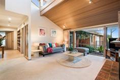 1 Hollyoak Rise Eltham North VIC 3095 $920,000 - $990,000 Exquisite Englehart design This feature-packed family Englehart home on 1300m2 could be just what you've been searching for, boasting beautiful high ceilings, quality finishes and a practical floor plan that ensures complete family comfort. The vast 2-storey interior includes a spacious kitchen/meals/living zone with granite benchtops, quality stainless steel appliances big island bench, stunning lounge with open fireplace and clerestory window, rumpus/billiard room for family fun, and a flexible TV retreat/family with open study. The master bedroom enjoys a robed dressing area and spa ensuite, while the huge 2nd bedroom can convert into two separate bedrooms. Upstairs delivers a sensational independent space with bedroom, walk-in robe, sleek ensuite and balcony with treetop views. A bright family bathroom and big practical laundry complete the interior. Outside, a wonderful alfresco zone is home to a swim-spa, pond and plenty of entertaining space, leading to pretty rear gardens. Quality extras include ducted heating, refrigerative cooling, air conditioning, ducted vacuum, security system, 3-phase power, 5000l water tank, double garage, 2-way driveway and good off-street parking. This first class home is positioned in a quiet neighbourhood within Eltham North Primary School zone and close to shops, schools, bus and parklands. Don't delay - this is it! Features Balcony Ducted Heating Built-In Robes Rumpus Room Vacuum System Study Alarm System Open Fire Place