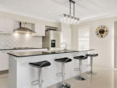 20 Admiral Street The Ponds NSW 2769 $1,050,000 STYLISH LUXURY LIVING Large sophisticated 2 year old single level family home set on corner block of land 537sqm (approx.) and built to the highest quality. Accommodation includes 4 double bedrooms (main with walk in robe and ensuite), 2 bathrooms with porcelain tiles throughout, media room, open plan lounge, Caesar Stone kitchen plus walk-in pantry, sunny landscaped gardens and double lock up garage with internal access. Other features include:- *Plantation shutters throughout *Extensive Alfresco living Italian tiles *Italian tiled floor in double garage *Kitchen also has gas cooktop, 900 stainless steel oven and dishwasher *4 Zoned ducted reverse cycle air conditioning and down lights throughout *Neatly manicured gardens - best in the street *Garden shed *Natural Gas BBQ Outlet *Side access Council rates: $352.00 per quarter approx Water rates: $278.00 per quarter approx Nearby schools Barnier Public Primary Government 0.42km Mary Immaculate Primary Catholic 0.42km Quakers Hill High Secondary Government 1.51km The Ponds High Secondary Government 1.0km LOCATION: The Ponds is a suburb of Sydney. Nearby suburbs are kellyville and Quakers Hill. Property Snapshot Property Type: House Features: CaesarStone Close to schools Dishwasher Double lock up garage Ducted Air Conditioner Ensuite Established Gardens Garden Shed Gas Landscaped Gardens Modern bathroom Modern kitchen Reverse cycle airconditioning Walk-In-Robes