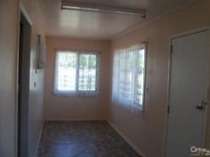 14 Rodney St Bowen QLD 4805 $215,000 FULLY FENCED, 2 BEDROOM HOME, LOW MAINTENANCE- AFFORDABLE BUYING Perfect for owner occupier, renovators or first home buyers This 2 bedroom, 1 bathroom home is ready for a new owner With a large sunroom/ sitting area at the front of the house, a roomy lounge room with adjoining kitchen and two good sized rooms Functional kitchen with plenty of bench and cupboard space - a new coat of paint would be the perfect face lift The bathroom is dated, however with the touch of some new fixtures this could be the large spacious bathroom you've been wanting Downstairs laundry with door leading out to the clothesline This property is fully fenced - safe for the kids or pets PROPERTY DETAILS $215,000 ID: 366469 Land Area: 607 m² Zoning: RESIDENTIAL