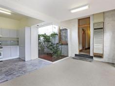 89 Swanston St Geelong VIC 3220 $490,000 Bluestone Cottage If you're after a prime piece of real estate in an unbelievably convenient location this charming Bluestone Cottage should be at the top of your list. From the moment you walk in the door you will be greeted with stunning traditional period features, such as high ceilings with ornate ceiling roses, sash windows and a cast iron fireplace. A central hallway separates the two bedrooms, both of which feature built in robes. This hallway then leads you to the formal lounge with an open fire place, dining or third bedroom. Further down the hall, you step down into the meals area & kitchen with a glass atrium - filling the rooms with light. The split system air conditioning & gas wall furnace will keep the house temperate, no matter what season. French doors lead out to the brick paved courtyard with a cottage garden. This period home has rear lane access to a remote controlled carport and small garage or extra storage space. Conveniently located to public transport and walking distance to Geelong CBD, this one not to miss out on. Property Snapshot Property Type: House Construction: Bluestone Land Area: 356 m2 Features: 10ft+ Ceilings Air Conditioning Built in Robes Close to Schools Close to Shops Close to Transport Courtyard Fireplace Formal Dining Room Formal Lounge Fully Fenced Yard Gas Gas Wall Heater Lounge Outdoor Living Storage Sunroom Verandah Workshop