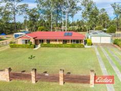 28 Squatter Ct Jimboomba QLD 4280 How Good Is (all of) This ! The house, The shed, The pool, The acre and The outdoor entertainment area – all here and all good news ! Situated at the end of this quiet cul de sac on a level acre (4000 sqm), with town water, your inspection here at Flagstone will reveal a well presented steel framed family home with all the MUST HAVE features already in place. You will enjoy a comfortable air-conditioned lounge with views out over the front of the property, leading through to a separate dining on one side of the kitchen with the family room being open plan to the kitchen on the other. Like the lounge, air-conditioned comfort awaits your inspection of the family room, complimented perfectly by a combustion heater for those chilly winter evenings. Plenty of high and low level cupboards in the kitchen with plenty of bench space too and views out through the entertainment area to the pool and all that yard and shed space beyond. Double built-in robes feature in all the bedrooms, while the air-conditioned master has a walk through robe, his on one side, hers on the other, to the en-suite bathroom which also benefits from an oversize shower a thoughtful addition and something that you will also find in the family bathroom. The outdoor entertainment area is perfectly positioned for easy access to the in-ground salt pool, the perfect spot for your family to cool off on those hot summer days. The shed space is sure to impress – 6m x 12m, with an internal (removable wall) to give dedicated workshop space at the back, plus an additional 6m x 7m high car port to give an additional sheltered work area, as you can see in our images. So it’s currently configured for 2 car storage and large workshop. Alternatively it can be used for 6 car storage – the choice is yours. You will also find 2 more garden sheds and a large chook shed in the back corner, so fresh eggs are included in the sale ! Schools, shops, parks and more are within walking distance, with more on the way, while Brisbane is yours within the hour and the Gold Coast a little over. So if you have been looking for that (almost) mythical family home that has it all – the pool, the shed, the 4 bedroom steel framed home, the outdoor entertainment area all of which is on a level acre in a quiet street, then your search is over. Book your inspection and bring your deposit, because if you don’t then somebody else will ! Property Details Elders Property ID: 9679599 4 bedrooms 2 bathrooms 6 car parks Land Area 4000 square metres 6 car garage Related Elders Services Elders Home Loans Loan Calculator | 1300 LENDING Elders Insurance Request a Quote | 13 LOCAL