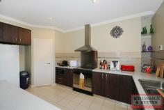 6 Corine Way Bayonet Head WA 6330 $525,000 UNIQUE HOME, GREAT LOCATION - Spacious 4 X 2 bathroom plus study and sep lounge - Large open plan living/dining area w' Chef Kitchen - Outdoor dome patio and aggregate floor - Close to Flinders Park Primary School, and Bayonet Head Shopping Centre This spacious uniquely designed 2006 brick veneer home located on a quiet street in ever popular Bayonet Head. With side gate access to very private back yard, where you will find a dome patio with aggregate flooring all on a flat 719m2 block. The front of the house has fantastic road appeal with feature columns and an entrance pathway. Upon entering the home you will find the master bedroom to your right with large WIR housing plenty of shelving and hanging space, ensuite with a separate toilet. Off to the left is a separate lounge for those home movie nights the whole family can enjoy then further down the hall is a large study or a 5th bedroom. Follow the hallway through to a very spacious well-appointed open plan kitchen, dining and lounge. The chef's kitchen has a built in pantry feature bench divider and plenty of cupboard space, high ceilings, wood floor look vinyl throughout living and hallways. Dining is exceptionally large currently holding a 10 seater dining table with a reverse cycle air conditioner to heat and cool the dining/lounge area. Off the dining room down a small hallway is the other 3 bedrooms with double mirror sliding door BIR's, main bathroom with shower and bath and a separate room with vanity and floor to ceiling mirror, laundry with separate toilet. Located only a short drive to Flinders Park Primary School, new Bayonet Head shopping centre, local pharmacy and parks this fabulous family home won't last long call Kathleen Mier today on 0439 421 059.