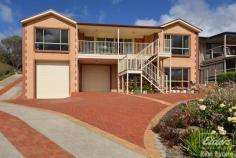 13 Laurie Ave Encounter Bay SA 5211 $565,000 Let me see forever but I ask you please - Don't fence me in. Laurie Avenue is set proudly on high, overlooking a spectacular vista of the Victor Harbor Township, rolling hills and the panorama of sea and Islands of Encounter Bay. Despite its location it is surprisingly protected and an oasis for anyone seeking to downsize yet not be hemmed in. Comprising – • Upstairs – 3 spacious bedrooms, master fit for a king – or two joined king singles in this case – complete with views, en suite and walk in robe • Warm and welcoming central open plan living with floor to ceiling picture windows and views • Solid oak kitchen with adjacent meals area, both with views • Bedrooms 2 & 3 with built in robes and serviced by the delightfully decorated main 3 way bathroom with dual vanity powder room and spa • Large laundry with linen and broom cupboard and direct access to single carport at rear • Downstairs – Granny flat, open plan with en suite and kitchenette – extra bedroom easily added. • 3 bay garage comprising high clearance caravan bay with panel lift door, car garage with panel lift door and workshop bay with window to views and 3 phase power. • Sweeping concrete driveway – but don’t be deterred as our current vendors back a huge caravan up it and there are several spots to turn around so you can drive out forwards. Steps at the front of the home are optional as you can come straight into the top level from the back of the home. • Nicely landscaped with low maintenance, easy care gardens • 22,000 litre rainwater tank – into the home • Ducted reverse cycle heating and cooling AND vacuuming! This is what you get when you take a farming couple off of the land and down size them. Only a few minutes to the centre of town and all Victor Harbor has to offer all manner of age groups. Don’t pass this quality built home by if you are after something a little bit special. Other features: Built-In Wardrobes,Garden,Secure Parking,Formal Lounge,Separate Dining,Terrace/Balcony Property Details Elders Property ID: 9233038 4 bedrooms 3 bathrooms 7 car parks Land Area 859 square metres Car Parks: 4 Double garage Single carport Air Conditioning Related Elders Services Elders Home Loans Loan Calculator | 1300 LENDING Elders Insurance Request a Quote | 13 LOCAL