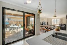 126 Warralily Boulevard Armstrong Creek VIC 3217 $429,000 - $459,000 Stylish & Spacious Family Home This contemporary family home perfectly combines spacious living with a relaxing coastal lifestyle. Situated on a 579m2 approx. allotment this home is close to walking tracks and playgrounds and is just a 15 minute drive to the Waurn Ponds Shopping Centre or Surf Coast. The front of this deceivingly large home offers drive way parking for two vehicles which lead to the large double remote garage with internal access. Upon entry you instantly have a sense of space and light as you are greeted by the wide open foyer with stunning tiled floor. From here you find a large functional study and the generous master bedroom with sitting area which is complimented by the large double walk-in robe and luxurious ensuite with double vanity, large shower and free standing bath tub. The wide, open hallway then leads to a comfortable living room or kids retreat. Further along you arrive at the heart of the home which is a well designed open plan space incorporating generous living, dining and stunning kitchen featuring stone bench tops, large walk-in pantry and quality stainless steel appliances including 900mm gas cook top/oven, range-hood and dishwasher. From here sliding doors then lead out to the large undercover and decked al fresco area, perfect for those who love to entertain outside all year round. Off the main living area and to the rear of the home are three great sized bedrooms all with built-in robes, a smart and stylish central bathroom with separate toilet and a functional laundry with an abundance of space and storage, and external access. With additional features such as gas central heating, solar panels, data points and side gate access through to the rear yard this beautifully appointed home has everything a family requiring more space could need. Features Study Price Guide: $429,000 - $459,000 | Land: 579 sqm approx | Type: House | ID #534210