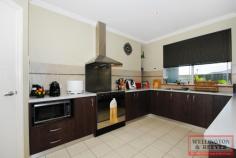 6 Corine Way Bayonet Head WA 6330 $525,000 UNIQUE HOME, GREAT LOCATION - Spacious 4 X 2 bathroom plus study and sep lounge - Large open plan living/dining area w' Chef Kitchen - Outdoor dome patio and aggregate floor - Close to Flinders Park Primary School, and Bayonet Head Shopping Centre This spacious uniquely designed 2006 brick veneer home located on a quiet street in ever popular Bayonet Head. With side gate access to very private back yard, where you will find a dome patio with aggregate flooring all on a flat 719m2 block. The front of the house has fantastic road appeal with feature columns and an entrance pathway. Upon entering the home you will find the master bedroom to your right with large WIR housing plenty of shelving and hanging space, ensuite with a separate toilet. Off to the left is a separate lounge for those home movie nights the whole family can enjoy then further down the hall is a large study or a 5th bedroom. Follow the hallway through to a very spacious well-appointed open plan kitchen, dining and lounge. The chef's kitchen has a built in pantry feature bench divider and plenty of cupboard space, high ceilings, wood floor look vinyl throughout living and hallways. Dining is exceptionally large currently holding a 10 seater dining table with a reverse cycle air conditioner to heat and cool the dining/lounge area. Off the dining room down a small hallway is the other 3 bedrooms with double mirror sliding door BIR's, main bathroom with shower and bath and a separate room with vanity and floor to ceiling mirror, laundry with separate toilet. Located only a short drive to Flinders Park Primary School, new Bayonet Head shopping centre, local pharmacy and parks this fabulous family home won't last long call Kathleen Mier today on 0439 421 059.