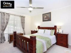 3 Corvus Dr Cashmere QLD 4500 $665,000 Price reduced to sell! Beautiful lowset home in Greenwoods estate. This beautiful low set home is situated on a very generous 1,468m2 block of usable land in the lovely and sought after Greenwoods estate. It comes with four sizeable built in bedrooms, all with ceiling fans. The Master bedroom is complete with an air conditioner and a walk through wardrobe leads through into the en suite bathroom. The en suite also features a luxurious spa bath (with new motor). The formal lounge and dining area flows into the kitchen and family room and whether you love to socialise or relish peace and quiet, this home most certainly satisfies. The family area is also air conditioned for your comfort in the hot Summer months. There is a generous double lockup garage, and side access leading to a two bay shed with a covered carport which is suitable for a boat or caravan to be parked. This home is ideal for all your entertaining needs with a 49m2 covered patio and there is plenty of room for a pool in the spacious back garden if one so desires. A 3m2 greenhouse will be an asset to the keen gardener. The only way to truly appreciate this picturesque home is to come and view for yourself so call us now to book your inspection. PROPERTY DETAILS $665,000 Negotiable ID: 365238 Land Area: 1468 m²