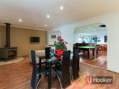 49 Clive St Hampton Park VIC 3976 $380,000+ Loving Family Home Are you looking for a well-kept family home that has all the bells and whistles? Well look no further as we have found you this beautiful three bedroom delight, located in a prime location close to High schools and primary schools, public transport, Hampton Park Shopping complex and freeway entrances. As you approach the securely fenced home you are led by the well-established gardens to the front door where you will be greeted by the large light filled lounge room which embraces you to feel at home. Continuing through you will then be met with the hostess kitchen with gas appliances and plenty of cupboard space; this overlooks the meals and family area with a gas log fireplace creating a warm and comforting environment. Step down into the sunken rumpus room where you can enjoy a game of pool and entertain friends at the inbuilt wet bar, that comes with a bar fridge, shelving and cupboard space and is nearby the second bathroom. There are three decent sized bedrooms on offer all of which have built in robes, the master bedroom positioned at the front of the house which has the added benefit of a two way bathroom with a bath. Further comforts of the home are ducted heating, an air conditioner and floating floorboards . Make your way out to the great outdoors where you will be the life of the party and entertain under the pergola with a timber decking that overlooks the spacious backyard with a garden shed and a double carport as well as extra car space to park three more cars, all this on a 598m2 block (approx). This perfect home is family living at its finest, as well as entertaining which lends itself to a fulfilling life, full of happiness and fond family memories. We extend an invitation to personally inspect this gracious family home, so make your enquiry today and start your family living! Property Snapshot Property Type: House Construction: Brick Veneer House Size: 598.00 m2 Land Area: 598 m2 Features: Billiard Built-In-Robes Close to schools Close to Transport Decking Ducted Heating Ensuite Family Room Fully Fenced Yard Garden Shed Gas Landscaped Gardens Lounge Pergola Rumpus Room Storage Undercover Entertainment Area