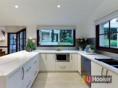 10 Pleasant View Cres Wheelers Hill VIC 3150 Pleasant View in Prestigious Street Californian style living and first class prestige defines this lavish residence infused with executive luxury enduring you to wanting more. Situated in one of Waverley's high end areas with elegance and pristine luxuries; you will instantly fall in love with what this stunning and outstanding quality family home has to offer. Make your way up the abstracted wooden panelled stairs to the front entrance and be welcomed by the bright and bedazzled open formal lounge sitting on the first floor with a stunning architectural stack stone feature wall embedded with an enhancing fire place creating a warm and embracing ambience. Perfectly positioned and adjoining is the formal dining area a gracious sanctum to entertain important guests in. Elegantly flowing through to the state-of-the-art stone kitchen the master chef of the family will love, with top of the range stainless steel gas appliances, a dishwasher, a glass splash back and plenty of bench and cupboard space whilst overlooking luscious greenery. Adjacent to this is the family area where you can spend quality time with loved ones, with an additional attribute of window doors allowing you direct access to manicured gardens. Sophistication on multiple split levels is where you will find four grand over-sized bedrooms fit for a king which include an opulent master suite with a walk in robe, extravagant en-suite, a retreat area and balcony that captures majestic views of the Dandenong Ranges. Further comforts of the home are: ducted heating, split system cooling, ducted vacuum, a guest bathroom, down lights throughout, parquetry flooring, carpets, tiles, a security alarm system, irrigation system, stone water feature and a double carport. Occupying an elevated corner block of 1,400m2 (approx.) covered with designer landscaped gardens and surrounded by beautiful outdoor Merbau decking, this architectural masterpiece is minutes to Jells Park, Waverley Golf Course, Caulfield Grammar, The Glen and transport. Contact Zed now to avoid disappointment. Property Snapshot Property Type: House on acres Features: Built-In-Robes Close to schools Close to Transport Ducted Heating Ducted Vacuum Ensuite High Ceilings Landscaped Gardens Parquetry Floors Storage Walk-In-Robes