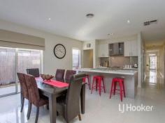 45 Brownlow Dr Point Cook VIC 3030 $545,000 to $575,000 Stunning family home in the heart of Point Cook LJ Hooker Point Cook presents 45 Brownlow Drive, Point Cook. Ideally situated just a few streets away from vibrant Boardwalk Central shopping village in Innisfail estate and packed with exceptional inclusions, this beautifully presented and quality built home has ample entertaining areas effortlessly catering for any social situation. The flowing floor plan comprises four good sized bedrooms, two separate living spaces, alfresco and double garage creating an enviable contemporary living environment in a well advantaged location - this home is one not to be missed! Contact the agent for a private inspection or more information. - Total of four bedrooms including the main bedroom appointed with walk in robe and lavish en suite comprised of twin vanities, toilet and oversized shower. Bedrooms two, three and four are generously sized and fitted with mirrored built in robes. - Contemporary well-appointed kitchen comes complete with quality stainless steel cooking appliances including 900mm upright cooker, range hood, dishwasher, 40mm stone bench tops, large butlers pantry, glass splash back, gloss vinyl wrap cabinetry, soft close drawers and cupboards and island bench for casual meals. - Elegant open plan living spaces including formal lounge with French sliding doors and spacious open plan meals and family area adjacent kitchen. - Sliding doors with double plantation shutters lead to the outdoor alfresco entertaining area under the main roof line, perfect for year-round entertaining. - Complete with luxury features including remote control double garage with internal and drive through access, ducted heating and evaporative cooling, porcelain tiles, alarm system, plantation shutters, security screen front door, down lights, linen cupboard, 5 star energy rating, instantaneous hot water, front and rear landscaped gardens and lots more. Located about 22km from Melbourne's CBD in Innisfail estate, this home is conveniently located near parks and playgrounds, childcare facilities, primary and secondary schools including the ever popular Stella Maris, walking distance to local amenities including Point Cook Town Centre, Boardwalk Central shopping centre and the growing Featherbrook shopping precinct, freeway access and the Williams Landing train station. Note. All stated dimensions are approximate only. Particulars given are for general information only and do not constitute any representation on the part of the vendor or agent. Property Snapshot Property Type: Single Storey Land Area: 425 m2 Features: Ensuite