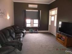 379 The Terrace Port Pirie SA 5540 $239,000 RETURN VERANDAH VILLA! This Solid Return Verandah Villa is beautifully located on a large corner allotment opposite parklands and set amongst other blue ribbon homes. The spacious home provides 3 huge bedrooms, modern tiled, 2 way bathroom with shower, bath, vanity and toilet. The kitchen is new and provides a top of the range stainless steel cooker that any chef would be proud of, breakfast bar and good cupboard space. There is a separate formal tiled dining room and a spacious lounge room complete with timber fireplace surround and reverse cycle split system air-conditioning for all year round comfort. Other features include high ceilings, quality carpets and floor coverings, extra wide hallway with arch, tiled laundry with built-ins plus much more. Externally, the home has a bull-nose verandah to the front, dual access, quality colourbond garage with power, concrete floor, kitchen and electronic rollerdoor. With a few finishing touches and minor detail to be completed, it will make this residence shine! PROPERTY DETAILS $239,000 ID: 367725 Land Area: 1104 m² Zoning: Residential