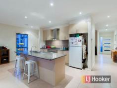 27 Flinders Park Dr Officer VIC 3809 $460,000 Move Up to This Address! Located in the extremely popular Arena estate in Officer, nearby to all amenities, shopping, transport, schools and the M1 Freeway which offers easy access to the Melbourne CBD is this neat, complete and stylish family home! Oozing street appeal with a modern facade, a wide portico creates an impressive entrance and lasting first impression! A lounge at the front of the home offers a separate living/TV area, while at the heart of the home is an open plan kitchen, dining and living hub catering for family friendly everyday living needs. Accommodation includes four bedrooms, the master with ensuite and WIR, while the remaining bedrooms have built in robes and are serviced by the main bathroom. Also included is a double garage with remote and direct internal access into the home as well as a rear roller door to the backyard. There is ducted heating and ducted refrigerated cooling throughout for year round comfort. The 400m2 (approx.) allotment offers a low maintenance lifestyle and incorporates an undercover alfresco entertaining area for all year use and enjoyment. This top location offers the lifestyle your family deserves, do not delay! Please note: All property details listed were current at the time of publishing. Due to extreme buyer demand, some properties may have been sold in the preceding 24 hours. Therefore confirmation of all opens with the listing agent within 24 hours of their scheduled opening is advised. Property Snapshot Property Type: House Construction: Brick Veneer Features: Alfresco Close to Transport Dining/Meals Ducted Heating Ensuite Family Room Lounge Remote Control Garaging Undercover Entertainment Area