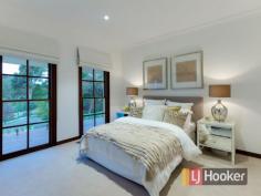 10 Pleasant View Cres Wheelers Hill VIC 3150 Pleasant View in Prestigious Street Californian style living and first class prestige defines this lavish residence infused with executive luxury enduring you to wanting more. Situated in one of Waverley's high end areas with elegance and pristine luxuries; you will instantly fall in love with what this stunning and outstanding quality family home has to offer. Make your way up the abstracted wooden panelled stairs to the front entrance and be welcomed by the bright and bedazzled open formal lounge sitting on the first floor with a stunning architectural stack stone feature wall embedded with an enhancing fire place creating a warm and embracing ambience. Perfectly positioned and adjoining is the formal dining area a gracious sanctum to entertain important guests in. Elegantly flowing through to the state-of-the-art stone kitchen the master chef of the family will love, with top of the range stainless steel gas appliances, a dishwasher, a glass splash back and plenty of bench and cupboard space whilst overlooking luscious greenery. Adjacent to this is the family area where you can spend quality time with loved ones, with an additional attribute of window doors allowing you direct access to manicured gardens. Sophistication on multiple split levels is where you will find four grand over-sized bedrooms fit for a king which include an opulent master suite with a walk in robe, extravagant en-suite, a retreat area and balcony that captures majestic views of the Dandenong Ranges. Further comforts of the home are: ducted heating, split system cooling, ducted vacuum, a guest bathroom, down lights throughout, parquetry flooring, carpets, tiles, a security alarm system, irrigation system, stone water feature and a double carport. Occupying an elevated corner block of 1,400m2 (approx.) covered with designer landscaped gardens and surrounded by beautiful outdoor Merbau decking, this architectural masterpiece is minutes to Jells Park, Waverley Golf Course, Caulfield Grammar, The Glen and transport. Contact Zed now to avoid disappointment. Property Snapshot Property Type: House on acres Features: Built-In-Robes Close to schools Close to Transport Ducted Heating Ducted Vacuum Ensuite High Ceilings Landscaped Gardens Parquetry Floors Storage Walk-In-Robes