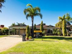 110 Kinross Dr Kinross WA 6028 $490,000 DON’T LET THIS ONE GET AWAY! Inspection Times: Sun 26/06/2016 01:00 PM to 01:30 PM Looking to purchase a spacious family home in a fabulous location? This is the perfect opportunity. It's ideally situated on a large 701m2 block; located in close proximity to schools, shops, parks and public transport. Tastefully decorated in neutral tones, this lovely 4x1 is move-in ready. Some of the highlights of this great property include: Inside features: -To the front of the home is the spacious front lounge room with large bay window -Master bedroom is light and bright with built-in robe and access to the beautifully refurbished en suite -Open plan kitchen, meals and informal lounge area -Kitchen features S/S appliances including Bosch dishwasher, heaps of cupboard space and large, well appointed pantry -Refurbished laundry with built in cupboards and toilet -Bedrooms 2, 3 and 4 are double size with built-in robes -Timber blinds throughout -Wood look, easy care flooring to main areas -Feature lighting -Ducted evaporative A/C to keep you cool in the summer months -Gas points -Linen cupboard with built in shelving Outside features: -Glistening below ground pool with new fencing -Large covered alfresco area, perfectly located next to the pool. Ready and waiting for your outdoor entertaining -Spacious grassy area located to the rear of the home -Low maintenance, reticulated gardens -Large garden shed -Double carport PROPERTY DETAILS FROM $490,000 ID: 371989 Land Area: 701 m²