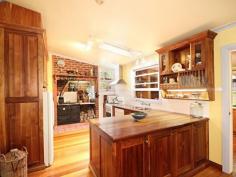 2005B Tarra Valley Rd Tarra Valley VIC 3971 $650,000 40 Hectares of unlimited opportunity with a beautiful country home. Impressive 4 bedroom renovated family home, with 2 comfortable living areas. Beautiful kitchen with black-wood cupboards, combustion stove and gas stove. All the trimmings you would expect in a country kitchen, giving this light and bright home the feeling of peace and tranquility. Spacious dining room, just the thing for special family occasions or every day living. Bathroom has separate shower and bath and 2 toilets. Solar hot water. Great outside living area. Extensive and beautifully established gardens with 2 spring fed dams and orchard. Bordering Tarra Bulga National Park and the Tarra River. 30ac tree plantation of Shining Gum, Yellow Stringy & Black-wood, good fencing, lane ways and annual rainfall. Annual income for rental of emergency tower site. Excellent new yards, designed for easy use with sheep and cattle. Shearing shed, workshop, 5 bay near new machinery shed. Additional 5 bay machinery shed, and another shed. 2 x 10,000gal and 1x5,000gal gravity fed water tanks. Close proximity to the newly opened Strezelecki walking track. School bus to gate. Property Snapshot Property Type: House Construction: Weatherboard Land Area: 40 ha