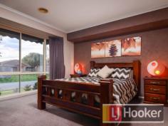 5 Cheshire Pl Narre Warren South VIC 3805 $525,000+ DON'T MISS THIS OPPORTUNITY To secure a beautiful home in a quiet location in Hillsmeade Estate. This 3 bedroom plus HUGE study home has been well loved, with new flooring throughout. The master bedroom at the front of the home has its own ensuite, and plenty of walk in robe space. You'll enjoy the feel of this spacious home, with formal lounge, family living plus rumpus, there is plenty of space for the whole family. Entertaining from the updated hostess kitchen which overlooks the dining and family room is complete with gas cooktop, two dishwasher drawers, updated appliances and plenty of bench space. With features such as gas ducted heating, back to base alarm, refrigerated cooling, oversized shower in ensuite & water saving showerheads, plenty of storage with fitted built in robes in all other bedrooms. Both bathrooms have been stylishly updated, rumpus with bar includes hot and cold water. So this is a home where the work has been done and you can move straight in. Powder room plus separate bathroom services the remainder of the home Step outside and enjoy the large outdoor entertaining area with ceiling fan, perfect for the family get togethers, in an idyllic setting surrounded by low maintenance gardens and a good patch of lawn for the kids to play. Furthermore, enjoy the pool and decked area in the warmer months, plus a double garage with remote, rear roller door and garden shed. A great community experience as all this is within walking distance to a selection of schools, Casey Central Shopping Centre, bus stops, sporting fields, parks and playgrounds, you don't want to miss out! Property Snapshot Property Type: House House Size: 28.00 m2 Land Area: 631 m2 Features: Ensuite Pool