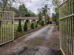 11 Tregarthen Rd Summertown SA 5141 $490,000 - $540,00 GRAB A PAINT BRUSH OPEN INSPECTION SUNDAY 3RD JULY 11.30AM - 12.00PM A stunning home in its day, this property was built to a high standard with a beautiful garden to compliment it. The bones of this home and garden remain and offer the new owner a wonderful opportunity to restore the property to its former glory with updates along the way. As is, the solid brick home presents with a very live able three bedrooms, two of which have built in robes. Raked ceilings in the formal living and dining room give the feeling of space and light and are kept comfortable in the winter months by a gas (bottle) heater. The large kitchen and family room offer an abundance of bench space and have an updated stove, cooktop and stainless steel splash back. This area also contains a cast iron slow combustion heater which can heat most of the house when up and going. Although original the bathroom and laundry are large in size and perfect for the growing family. A large paved and covered area leads directly off the family room offering protection from the winter weather and a wonderful west facing summer alfresco dining option. There is ample water storage in the form of a concrete tank which is backed up with a bore (non metered) allowing the maintenance of a garden even in the driest of periods. A four car garage and single carport (high access) along with extra wood sheds and chicken run just add to the features of this property. Set a short stroll from a bus stop with direct city access the property is a 15 minute drive to Burnside or ten minute drive to Stirling. It would be a pleasure to show this property for those looking to update a family home to its former glory. Please contact Mark Burns on 0404151804 or at mburns.blackwood@ljh.com.au for inspection times or further details. Property Snapshot Property Type: House Land Area: 2,400 m2 Features: Outdoor Entertaining Fully Fenced Workshop Dishwasher