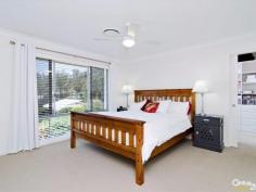 7 Oaklands Pl Upper Kedron QLD 4055 DOWNSIZE WITHOUT COMPROMISING ON STYLE & SOPHISTICATION. Crafted to deliver a living experience of a premium standard, those lucky enough to call this place home will delight in a zoned single-level layout dressed with gourmet two-pack kitchen with quality stainless steel appliances and Cesarstone benchtops, 9ft high ceilings and ducted air-conditioning. What's also certain to strike the right chord amongst the growing family is the idyllic blend of living spaces, along with the manner in which all bedrooms are thoughtfully nestled in private sections of the home. A large Master bedroom (with luxurious ensuite and walk-in robe) stands alone at the front of the home, with the children's quarters tucked away on a separate wing with a central family bathroom and media room. Class and elegance defines the striking formal lounge and dining arrangement, which extends onto a private, covered entertaining area, ideal for serving canapés and pre-dinner drinks during those formal gatherings. Stunning open-plan living is therefore left to steal the show at the top of the layout, impressing with its excellent sense of space and low maintenance lifestyle. Surrounded by quality homes and set amongst meticulously maintained, low maintenance gardens this is the perfect sanctuary. A true statement in luxury living and innovative contemporary design and a must inspect. PROPERTY DETAILS UNDER CONTRACT ID: 369585 Land Area: 541 m²