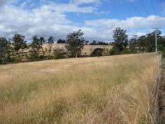 Lot 1 Delmore Road Wattle Hill TAS 7172 $99,000 Price Reduced - Owner Must Sell This rural block of land is approximately 1 hectare in size. It has good frontage on to Delmore Road with easy access to power from poles already on the property. The land has a gentle slope and is mainly cleared pasture. There is a creek near the back boundary and you have pleasant views of the surrounding countryside and looking down the valley. The property would enable you to enjoy a relaxed lifestyle in a relatively peaceful and private location which is less than fifteen minutes drive from Sorell. The beaches of Dodges Ferry are also within easy reach. Take a drive and inspect this lovely block. There are not many available like this in the area, so dont miss out. General Features Property Type: Land
