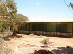 15 Wandilta Terrace Clinton SA 5570 $229,000 Home or Great Weekender A roomy 2 bedroom home (ensuite) + Sunroom / 3rd bedroom all under the main roof. Generous lounge / family room with sliding door access to enclosed rear verandah for entertaining family & friends. An easy care landscaped yard & 50' x 20' shed (workshop included) + Detached entertaining area for BBQ's & eating the fresh crabs that Clinton is known for. A secluded location on a corner block offering a distant sea view & within 500 meters to boat ramp & white sandy beach. Property Snapshot Property Type: House Construction: Hardiplank Features: Ensuite Established Gardens Family Room Fenced Back Yard Fully Fenced Yard Outdoor Living Sunroom Undercover Entertainment Area