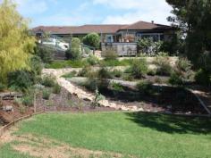 15 Nicholas Ave Metung VIC 3904 $525,000 TAKE A DEEP BREATH AND.......RELAX With a peaceful lake outlook to the East and beautiful rural outlook to the North you'll be glad you're living here. In your spare time you can tend to the orchard full of fruit trees such as Avocado, Almonds,Peach, Pear and Fig just to name a few. The beautifully layed out and tiered garden areas and private timber decks provide excellent relaxation and entertaining spaces all year round. The kitchen features all modern conveniences and a movable island bench with adjoining meals area and large open plan living with solid fuel heater and split system air-conditioning. 4 bedrooms and 2 bathrooms or 3 bedrooms and a separate flat with kitchenette and bathroom (sep.entrance), its ideal for in-laws or larger family. A double carport, and 2 garden sheds complete this lovely property. Property Snapshot Property Type: House Land Area: 3,440 m2 Features: Decking Dishwasher Ensuite Established Gardens Garden Shed Waterview