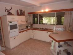 227 Langley Rd Cudlee Creek SA 5232 $695,000-$715,000 THE SANCTUARY – TRANQUILITY STARTS HERE! - 10.176 ACRES Privately nestled along a quiet hills laneway ‘The Sanctuary’ at Cudlee Creek is one of the most tranquil properties we have come across in the last 25 years! From the moment you turn into the long driveway you will immediately take in the outstanding creek setting with a variety of pretty waterholes creating the most peaceful of locations you are likely to find. Offering a mix of parklike acreage, undulating to rising land with ample room for a pony ‘The Sanctuary’ offers everything you could want in an ‘Escape to the Country’ style property – yet only 20 minutes from the convenience of Tea Tree Plaza! The architect designed solid brick home of 3-4 bedrooms is a further delight and blends into its environment superbly. The ‘wow’ factors with this home are many and varied including the tranquil indoor garden entrance hall with a walk through water feature. Step down to the spacious living room with wood heating, raked ceilings and a calming stone feature wall and you cannot help but be impressed. Three comfortable bedrooms are complimented by a large study/office which would make the perfect 4th bedroom with great views over this lush property. The large and well equipped kitchen overlooks the dining area and opens to the entertaining size verandah where relaxing comes easy. A peaceful pond is the centrepiece of the stunning outdoor entertaining area and will ensure you slow down to enjoy the lifestyle on offer here – which is simply second to none! The family bathroom is a ‘one off’ with 2 baths, an indoor garden and a water haven inspired outlook that will not fail to please. With far too many features to list here ‘The Sanctuary’ is a unique family home in a very unique setting. Beautifully maintained and with absolutely nothing to do the property is further enhanced by quality shedding, carporting, an underhouse gym and ample rainwater storage. If you have been looking for a very manageable Adelaide Hills acreage offering a lifestyle of calming tranquility then you must inspect 227 Langley Road, Cudlee Creek. Expect to be impressed! Elders Property ID: 9983012 4 bedrooms 1 bathrooms 4 car parks Land Area 41200 square metres Double garage Double carport