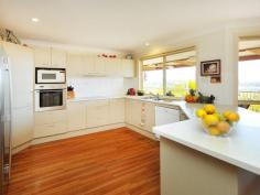 16 Haviland St Woolgoolga NSW 2456 $580,000 - $620,000 The Owners Packed! Looking for a spacious home on the coast conveniently placed within walking distance to everything you need? Then look no further this family home offers so much more than you would first think, 4 large bedrooms with built in robes main bedroom with walk in robe and generous ensuite, stunning open plan kitchen with impressive views of the mountains and the ocean, a convenient placed formal loungroom also takes advantage of stunning Woolgoolga outlook. The home will accommodate the guest too with a spacious entertaining deck perched high over the tropical setting back yard, fully fenced the rear yard offers the large in ground pool plus room for the kids or pets to run around. Storage is taken care of with dry access under the house with its own workbench and Gym area. This home is located in a very tightly held pocket of Woolgoolga and it is no wonder why with the stunning ocean views and sea breezes, it is truly a neighbourhood you will enjoy being a part of. Property Snapshot Property Type: House Construction: Brick Veneer Land Area: 695 m2 Features: Built-In-Robes Close to schools Close to Transport Coastal Courtyard Decking Dining Room Dishwasher Ensuite Family Room Fully Fenced Yard In-Ground Pool Lounge Outdoor Living Polished Timber Floors Rumpus Room Storage Study Waterview