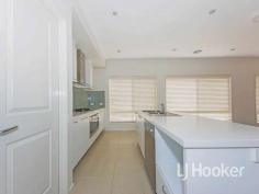 67 Beachview Parade Sanctuary Lakes VIC 3030 $530,000 to $540,000 Resort-style retreat LJ Hooker Point Cook presents 67 Beachview Parade, Sanctuary Lakes. This superb modern home is a true balance of style and comfort; perfect for a growing family! Comprising four spacious bedrooms, this home is impressive both inside and out with an open-plan kitchen, two separate living zones and low maintenance landscaped gardens. This beautiful residence is near shops, parks and schools and enjoys access to the fabulous resort facilities and 24 hour security. Inspect at the open for inspection this Saturday or contact the agent for a private inspection or more information. - Calling all investors with secure lease in place until 30/12/2016 at $400 per week (approx). - Boasting four bedrooms, including the main bedroom with double built in robes and en suite. Bedrooms two, three and four are each fitted with built in robes. - Contemporary kitchen with stainless steel cooking appliances including 900mm under bench oven, gas cook top and range hood, dishwasher, stone bench tops, glass splash back, microwave niche, pantry and island bench perfect for causal meals. - Exceptionally designed open plan living combining living and meals area adjacent the kitchen plus separate formal lounge upon entry. - Sliding doors from the living area lead out to the spacious backyard set on a 513m2 block (approx). - Complete with luxury features including double garage with internal access, ducted heating and cooling, alarm system, down lights, separate laundry, linen cupboard, landscaped gardens and more. Located about 22 km from Melbourne's CBD in Sanctuary Lakes, you will enjoy resort facilities including gym, swimming pool and tennis courts, waterfront Village Centre with shopping and dining options, 24 hour estate security monitoring and nearby open areas with walking tracks and wetlands. Plus there's the added benefit of an optional membership to the golf course. Note. All stated dimensions are approximate only. Particulars given are for general information only and do not constitute any representation on the part of the vendor or agent. Property Snapshot Property Type: Single Storey Land Area: 513 m2 Features: Ensuite