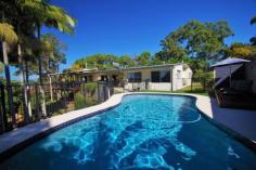 63 Hillcrest Ave Nambour QLD 4560 $595,000-$635,000 DOCTOR'S OWN MAJESTIC HOME SOLID 70s BUILD WITH MODERN CENTURY MAKE-OVER 1ac+ GRAND POOL VIEWS LOCATION One of Nambour's finest residences in a superb location elevated with lush views to the east over town including an ocean glimpse. Modern rendered brick with solid hardwood frame to suit a big family. The vendors have spent an enormous amount of time and money inside and out to prepare their wonderful and expansive home for sale; this even includes re-wiring and re-plumbing! Upstairs comprises 4 robed bedrooms (master with large ensuite and long walk-in robe), 2 bathrooms and spacious open plan living with bamboo flooring. The large kitchen boasts Indonesian rosewood carpentry plus stainless steel appliances, gas hotplates, plumbing for fridge, soft-close drawers and lead-lighting. 2 air-conditioners plus combustion fire place. Complete with internal timber stairs to downstairs storage basement currently utilised for large extra living with amenities. Plenty of storage space. Outside is a treat; with 3 covered entertainment areas and a sparkling re-surfaced pebble pool complete with night-lit feature wall and beautiful surrounds. The private and peaceful over 1 acre block is wonderfully rock-walled and landscaped with a variety of vegetation including ornamentals, fruit trees and natives. Double carport with extra capacity for a trailer. Fenced for a dog. Tranquil culdesac position. Property Details Elders Property ID: 9761815 4 bedrooms 3 bathrooms 2 car parks Land Area 5901 square metres Double carport