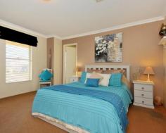31 Teague Way Lakelands WA 6180 $459,000 - $499,000 BEAUTIFUL FAMILY HOME WITH ALL THE EXTRAS!!! This exceptionally built Dale Alcock loft home built in 2006 on a 758 sqm block has every one of your extras covered, including a loft retreat, study and theatre As soon as you walk through the double doors you will feel the spacious flow of this exceptional family home. Head upstairs to the perfect teenage or parents retreat. The study and the spacious master bedroom overlook the front of the property. The master has the benefit of a huge walk in robe and reverse cycle ac and an ensuite which has the inclusion of a spa bath. There are three further great sized double bedrooms located to the side of the property which are carpeted and stylishly decorated. The perfect meeting place would be in the open plan kitchen, dining and family area. With its vaulted ceilings and wooden flooring the area has a modern and airy feel. The kitchen has stainless steel appliances and plenty of room for the chef to maneuvere. This area overlooks the alfresco which has been extended again which a pitched roof, which currently houses the above ground spa. The garden has the benefit of a powered workshop, garden shed, side access and even an outside shower. Some of the many additions to this home are:- evaporative ac, reverse cycle ac to the master bedroom and loft retreat, huge sliding door storage cupboard to the hallway, under stair storage and security system. Call Susan now on 0416780128 for your private viewing as this house wont be on the market for long!!! Other features: Built-In Wardrobes,Close to Schools,Close to Shops,Close to Transport,Garden,SOLAR 3KW INVERTER Property Details Elders Property ID: 10021895 4 bedrooms 2 bathrooms 2 car parks Land Area 758 square metres Double garage Air Conditioning