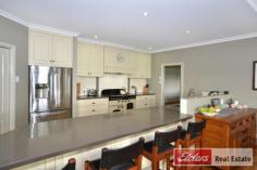 15 Manton Way Willyung WA 6330 The Perfect Property ELDERS EASY AUCTION - SATURDAY 27TH AUGUST AT 11AM - UNLESS SOLD PRIOR • Carefully designed and crafted home in quiet cul-de-sac. • Quality fittings and fixtures to home; double glazed windows & ducted vacuum. • The ‘Queenslander’ styled home offers an unobstructed tree view. • 4 large queen size bedrooms plus large office. • The home provides spacious living areas with french doors on to deck. • Wide verandahs and deck create the perfect setting for entertaining. • Easy access to the home from the large rear garage into house. • 2 Rainwater tanks offering 70,000L capacity run water into house, scheme water available. • 4,379sqm of land, easy vehicle access to shed at rear. • Shed measures 144sqm and includes a large mezzanine for extra storage. • Separate 1 bedroom self-contained accommodation in shed at rear. • Covered parking for 6+ vehicles, plus room for a caravan/boat. If you are looking for the perfect family home with room for everyone inside and out, look no further! If you are looking for a quality built home with room for the family when they come to stay, a good size shed and room for the caravan, look no further! Very seldom does a property like this become available so soon after construction that it presents like new. This home and property is the result of careful planning and diligent attention to care, it is a true credit to the current owners. Even the most discerning of buyers will find the home an absolute pleasure to visit. Set aside plenty of time to inspect 15 Manton Way because there is a lot to take in, features like; o High quality double glazed windows and doors throughout the entire home. o The home is fully insulated! With insulation under the floor, external and internal walls and 2 layers of insulation to the roof cavity. o A huge main living area with beautiful raking ceilings opens on to the deck and the view beyond. o Quality kitchen with sold surface bench-tops, well designed and carefully crafted cabinetry. o Premium appliances to kitchen; freestanding Falcon Cooker and noiseless integrated rangehood. o Ducted vacuum system with dustpan extraction unit to kitchen. o Large bathrooms with spa to ensuite and full height tiling. o Timber floors throughout the home. o Queen size bedrooms plus large study/5th bedroom. o 1 bedroom , self-contained flat to shed. Great for guests or teenage retreat. o Low maintenance decking to all verandahs and screening. o Solar panels to shed & Apricus Solar Hot Water Heater with 340L tank. This property is an absolute must see and will go to auction on Saturday 27th August at 11:00am – If not sold prior. Come to the next open home of contact Brendon Nowotny on 0432 998 035 for a private viewing at any time. Other features: Built-In Wardrobes,Garden,Secure Parking,Polished Timber Floor,Terrace/Balcony, fully insulated Property Details Elders Property ID: 10085147 5 bedrooms 3 bathrooms 4 car parks Land Area 4379 square metres Double garage Double carport Air Conditioning
