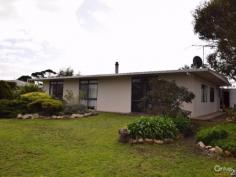 7 Seaview Rd Kingscote SA 5223 $385,000 1/2 AN ACRE ON TOP OF THE HILL! Looking for home on a bigger block with sea views? Tightly held location at the top of the hill, this attractive property boasts sea views north over Shoal Bay and behind over Nepean Bay. Sited on a corner block on a large 2000m2 with subdivision potential (stcc). The home has had all the big ticket areas completely renovated so kitchen, bathroom and laundry. The brand new, high quality "Swagman" kitchen includes a Miele dishwasher and plenty of bench space. Open plan living includes slow combustion fire which warms the whole home. Brand new bathroom with floor to ceiling tiles and seamless shower alcove for easy cleaning. Each bedroom has built in robes along with a linen press in hallway, so there is plenty of storage. Outdoor patio offers a protected place to entertain with enclosed yard safe for kids or pets. Watch the changing seascape from the kitchen window or patio. Outside there is plenty of room to enjoy, with the boundaries fully fenced, plus the house is separately fenced, along with the front of the block for chooks and an extensive veggie patch. Large double shed with workshop to tinker in. This is what KI life is all about.... Grow your own food and enjoy the lifestyle of spacious, seaside living. Contact Kate Palmer on 0438 531 480 to make a time to inspect. PROPERTY DETAILS $385,000 ID: 375904 Land Area: 2000 m² Zoning: Residential