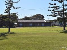 36 Brownlow Rd Kingscote SA 5223 $360,000 to $370,000 Stones Throw from the Beach! There is no substitute for Seafront! True to the saying, if you are serious about enjoying the ocean then there is no better place to be than on the seafront. Opportunities such as this do not present very often however this is a great buying opportunity. This seafront home is located only a stones throw from the walkway access to the beach and has the added advantage of adjoining a council bush land reserve. Offering 3 bedrooms and 2 bathrooms, the floor plan is both comfortable and functional and there is plenty of scope to redesign if you wish. The lounge area and 2 of the bedrooms enjoy the sea views, whilst the dining kitchen spaces overlook the spacious rear yard. Under cover vehicle storage is available under main roof or potentially and instant expansion option (subject council consent), particularly with access to the rear yard available also. Solar electricity panels are already installed and already input to the grid, helping to off set the cost of running the reverse cycle air conditioner. Perfect as a long term investment, well suited for permanent living, long term rental or holiday accommodation. PROPERTY DETAILS $360,000 to $370,000 ID: 378648 Land Area: 1079 m² Zoning: Residential