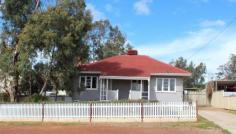 84 Hutt St Northam WA 6401 $169,000 Unbelievable Buy ! This freshly painted, new carpets and window treatments, fibro and tile home is priced to Sell. Its hard to believe that you can be the new owner of all this in a home for $169,000, complete with a white picket fence and workshop/garage. This three bedroom, one bathroom home needs to be on your list of homes to inspect. You have a lounge area with a split system air conditioner a kitchen/dining room, three bedrooms with a bathroom which includes a bath and shower over the bath. The laundry and separate toilet are located to the rear of the home. To the outside of the property is where you have your covered patio area, another paved uncovered area which will be ideal for summer barbeques. You have a carport to the side of the home for you everyday vehicle and you have a large cement floored, powered workshop/garage with a lean too on the side and a garden shed, so room for all your needs. The price is right with this property. Property Details Elders Property ID: 10432978 3 bedrooms 1 bathrooms 3 car parks Land Area 819 square metres Double garage Single carport Air Conditioning
