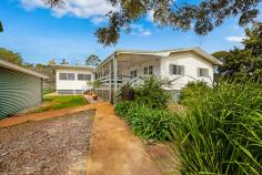7 Lindan Ct Cabarlah QLD 4352 $470,000 COUNTRY STYLE FARM HOUSE REQUIRES NEW NATURE LOVER Set on a picturesque 5800m2 of established flat land this fully renovated property offers a lifestyle few can match. Picture yourself on a lazy Sunday morning soaking in the sun on the North-East facing deck, feeling you are a world away but reality you are only a short 22minute drive to the Toowoomba CBD. Surrounded by establish gardens, chook pens, multiple sheds and even your very own bore, this property offers a piece of country lifestyle without all the hassle. Big enough to support a few large animals and the largest of vegetable gardens, but small enough that you don't have to spend your weekends maintaining it, it's the perfect blend. If getting back to nature is on your hit list, you can watch wallabies graze the land at sunset or watch the abundance of birdlife. Recently renovated the property has paid homage to the area and is finished in a modern farm house feel. Near new kitchen, ensuite, family bathroom and internal finishes make this ready for your family today. Cleverly positioned in the heart of the home is an exceptionally generous kitchen, dining and family room all on the North East aspect. This flows perfectly to the deck through two double French doors. A second enormous family room is on offer, flexibility here is key - it could be a formal lounge and dining, games room for the kids or even a pool room if needed. It has a country feel all round this home but offers modern convenience - Reverse Cycle air-conditioning, wood heater, solar panels are just of few of the homes features and it truly deserves an inspection. Further features of the property include: - Large kitchen complete with 900m oven, 900m gas stove top, island bench and full size pantry - Exceptional air-conditioned master suite, with generous ensuite - Further 3 bedrooms all with built in storage - Impressive family bathroom - Multiple living areas, one complete with wood fireplace/heater and reverse cycle air-conditioning - 7.5m x 7.2m Shed with two door access - Double height farm style shed, 6.0m x 6.0m - 1.5kW Solar System - 30,000 Litres of tanks plus connected to town water - 170ft Unmetered Bore water depth at 32ft with drinkable water - Stables (3 stalls and tack room) - Large Chicken Coup This really epitomises the country life style and if you are seeking a lifestyle change but close to the city this is a rare find. Be quick to attend the open for inspection as interest in these properties is strong.