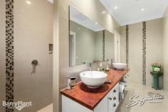 12 Reservoir Cres Rowville VIC 3178 $980,000 For the Most Discerning Buyer â Panoramic Views Architect designed and built, this home offers uninterrupted views from the living areas and elevated balcony/entertaining area, where relaxed evenings see the sunset recede and the lights flicker through a canopy of distance trees towards Waverley. The home is exquisitely finished in every respect and offers one level living with a downstairs studio, office and 6 car garage plus storage and workshop. Each detail in the home brings with it careful and thoughtful interior design, including a magnificent. Bespoke kitchen, Butler's Pantry, double ovens and refined finishes. The vast, rich granite bench is ideal for food preparation and entertaining. Natural light floods both levels of the home. For convenience, a laundry chute delivers apparel to the lower level, fully fitted laundry and alternate, zoned heating and cooling options throughout make for year round comfort. The Studio and Office have external doors and would also suit extended family living or home business. Hot and cold plumbing is connected on this level and the finishes are of the same premier standard. Nothing has been compromised. Landscaping is designed for low maintenance and year round beauty. A huge solar power system reduces electricity accounts to near zero. Quite exceptional â?? ideal for those with discerning taste and an appreciation of high end quality. Approx. 5 years old and 50 squares, plus with 3 phase power. Features Study Air Conditioning Built-In Robes