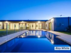24 Daniella Ct St Andrews Beach VIC 3941 When Only the Best will do! Nestled in a quiet court, in the ever popular St Andrews Beach, this home has been architecturally designed to incorporate light, space and storage and it certainly delivers. Offering 4 superbly sized carpeted bedrooms, master with WIR and full ensuite, 2 of the remaining bedrooms also have WIR and are serviced by a central family bathroom and powder room. Here you will also find a study and a rumpus/theatre room with built in shelving. The main living area, with modern polished concrete flooring, is vast with gorgeous contoured ceilings topped by clerestory windows and complemented by the expansive windows that line the living wall, bringing the outside in to you. Entertaining will be made easy in the centrally located kitchen with a walk in pantry, breakfast bar, ample bench space and stainless steel industrial Qasair range hood, Ilve gas cooktop and electric oven and Miele dishwasher. From the main living room and kitchen area you can step out onto the large, rear, north facing deck, where you can soak in the sun or take a swim in the massive built in, solar heated, self cleaning pool. Other features include; 6mx7m steel shed, 2x storage rooms, double glazed windows throughout, 2 x500L water tanks, bore water, 2 x hot water services the main is solar heated with a gas booster, fully fenced garden, with driveway access to the entire property, return front driveway and landscaped gardens all on a 2824sqm (approx.)allotment. Enquire today, as opportunities such as this are becoming few and far between. Realistic vendors, you can't ask for more.