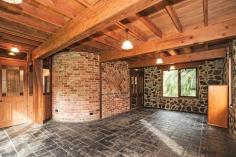 1011 Healesville Koo Wee Rup Rd Woori Yallock VIC 3139 $690,000 Over an Acre with Character Soaring ceilings welcome you when you enter this special two storey loft style home made of stone, recycled bricks and timber. The front entrance features leadlight panels, and some of the internal doors have decorative glass panels and handles. With three spacious living areas and three bedrooms, all with beautiful outlook to the surrounding gently undulating land of approx 1.4 acres (0.5998 ha), Shiloh is just waiting for a new family to enjoy all it has to offer. There is also extra storage or hobby space above the garage/carport, so come and explore for yourself and imagine what life could be like at Shiloh! Features Shed Built-In Robes Rumpus Room Remote Garage Floorboards Secure Parking