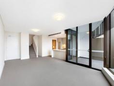 C2402/7 Australia Avenue Sydney Olympic Park NSW 2127 $1,050,000 - $1,100,000 Split-Level Luxe This one of a kind two-level apartment situates on the top floors of an ultra-modern and secure high-rise apartment block. The spacious living area on the lower level flows to the sky balcony and overlooks amazing 180 degree water views of the Parramatta River, Sydney Olympic Park and Sydney CBD. All of which can also be seen from the chef's quality kitchen which features caesar stone bench tops, Smeg stainless steel appliances and gas stovetop. The second level contains both bedrooms that are also gifted with the same spectacular views. A main bedroom incorporates a walk-in wardrobe and ensuite whilst the second houses a built-in. The two luxury bathrooms in the home are complimented by a third toilet and powder room in the lower level laundry. Ducted air conditioning, video intercom, secure car space, storage cage and outdoor gas outlet add to the convenience of the apartment's surroundings. With trains, buses, cafs, popular restaurants and all that the Sydney Olympic Park precinct has to offer literally at your doorstep, this exceptional residence is a must see.